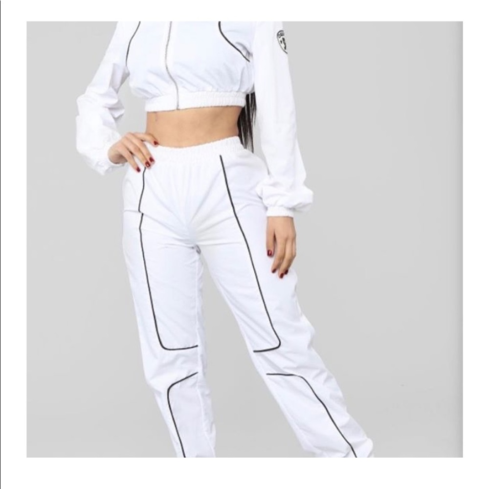 White tracksuit with black lining